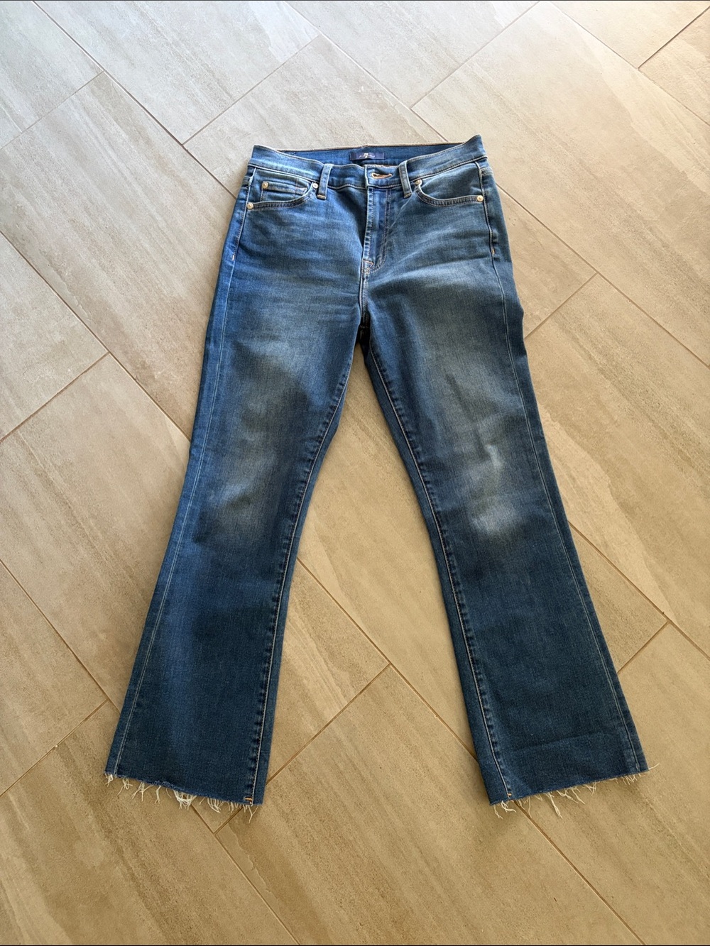7 For All Mankind Medium Blue Flare Jeans with Frayed Hem